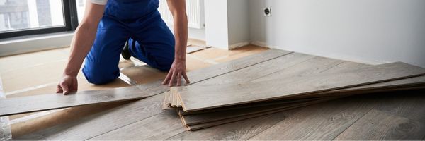 luxury vinyl flooring being installed by installer